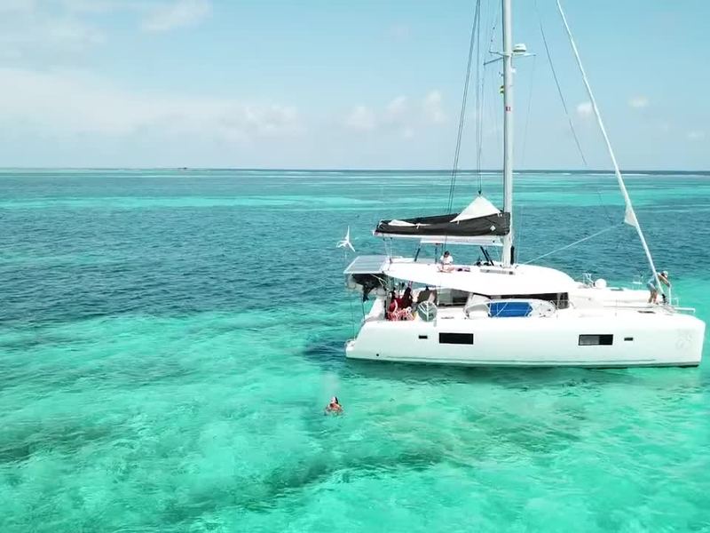 Catamaran in turquoise water in San Blas