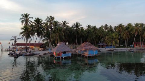 Cabins over calm water on Chichime